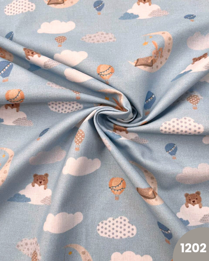 COTONE 100% - 1202 LUNA E MONGOLFIERA FONDO CELESTE