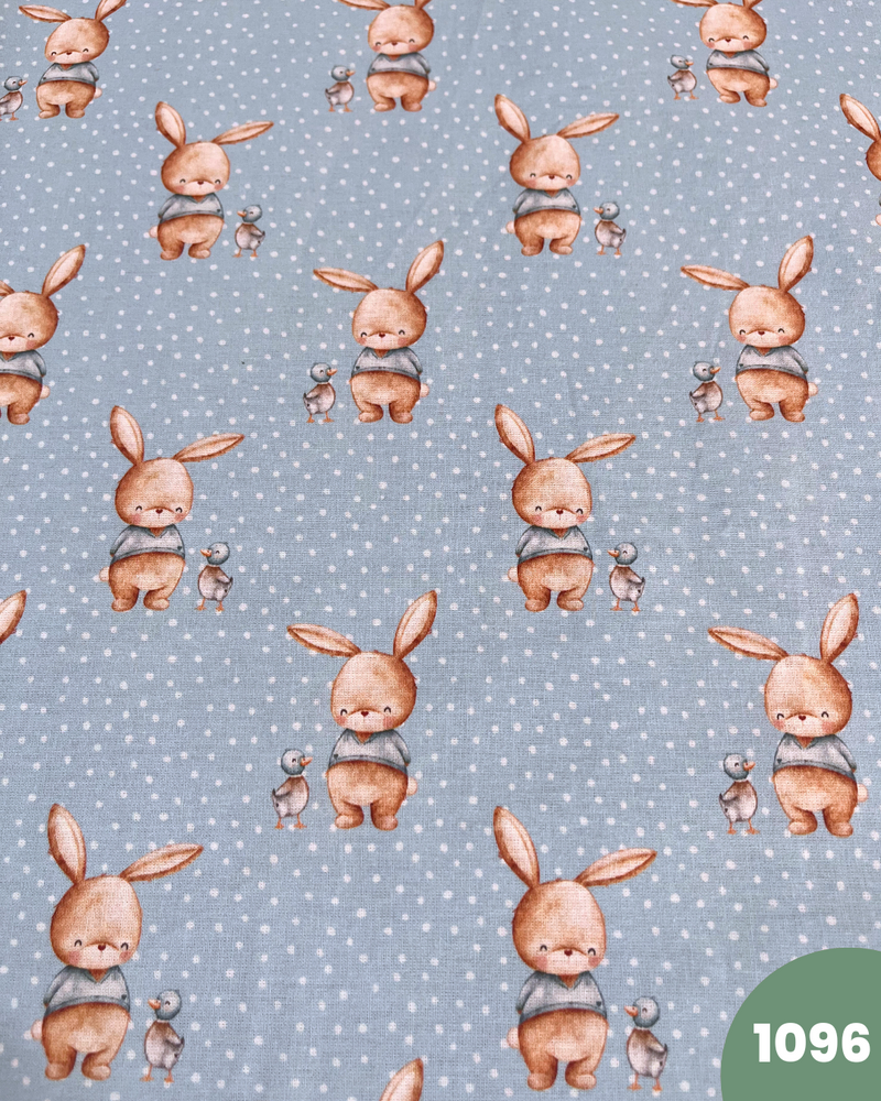 COTONE 100% - 1096 CONIGLIETTO FONDO CELESTE