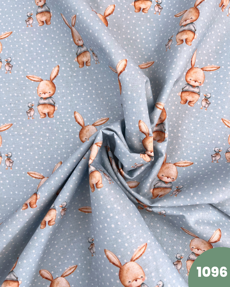 COTONE 100% - 1096 CONIGLIETTO FONDO CELESTE