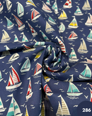 COTONE 100% - 286 BARCHETTA COLORATA FONDO BLU