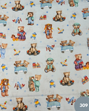 COTONE 100% - 309 ORSETTO IN AUTO FONDO CELESTE