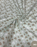 COTONE 100% - 343 CUORE DISEGNATO FONDO VERDE SALVIA
