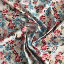 POPELINE DI COTONE FANTASIA - 065 FIORI COLORATI FONDO BIANCO