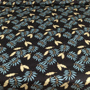 POPELINE DI COTONE FANTASIA - 069 FOGLIE BLUETTE FONDO NERO