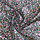 POPELINE DI COTONE FANTASIA - 088 FIORELLINO ROSA FONDO NERO A POIS