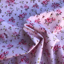 COTONE 100% - 114 ROSELLINE FONDO COLORATO TRE VARIANTI