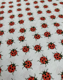 COTONE 100% - 193 COCCINELLA FONDO BIANCO