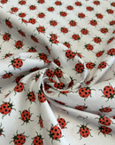 COTONE 100% - 193 COCCINELLA FONDO BIANCO