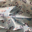 MISTO COTONE - 102 ZEBRA E CONIGLIETTO FONDO CELESTE