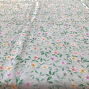 COTONE ARREDAMENTO - 321 FIORELLINI COLORATI FONDO VERDE CHIARO