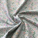 COTONE ARREDAMENTO - 321 FIORELLINI COLORATI FONDO VERDE CHIARO